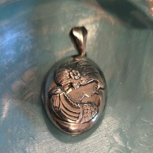 Elegant Silver Cameo Pendant